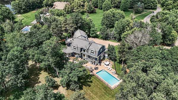 6.48 Acres of Land with Home for Sale in Gem Lake, Minnesota