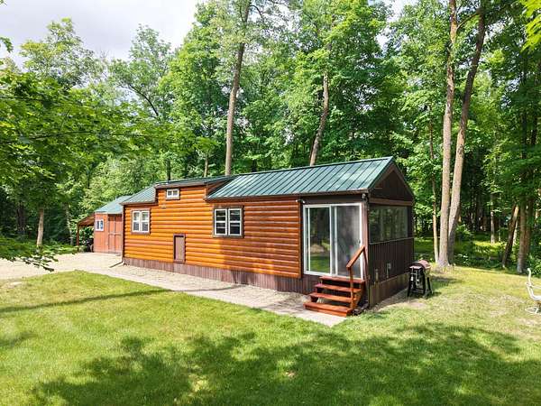 4.33 Acres of Land with Home for Sale in Solway, Minnesota