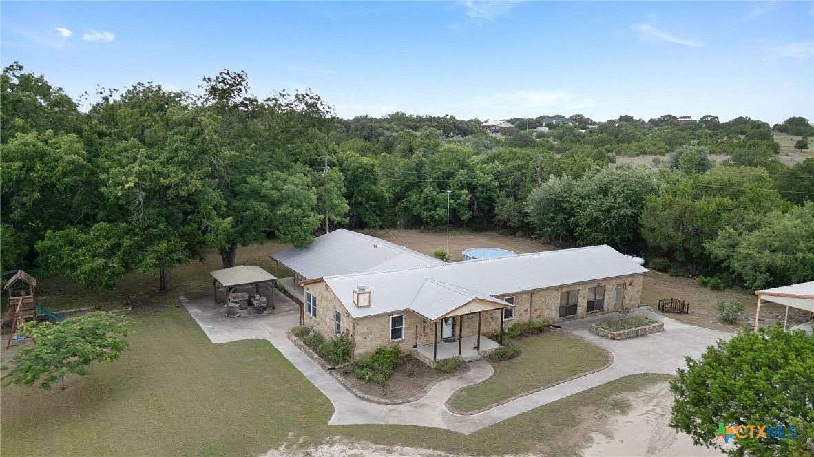6.86 Acres of Land with Home for Sale in Lampasas, Texas