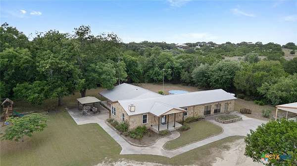 6.86 Acres of Land with Home for Sale in Lampasas, Texas