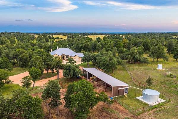 30.7 Acres of Agricultural Land with Home for Sale in Fredericksburg, Texas