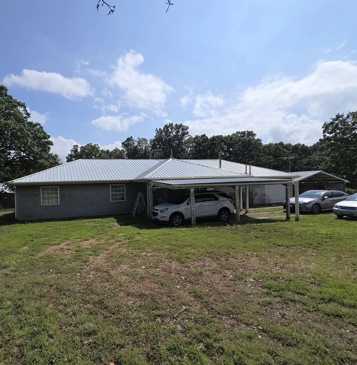 4.29 Acres of Land with Home for Sale in Long Lane, Missouri