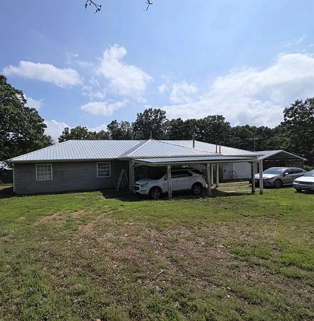 4.29 Acres of Land with Home for Sale in Long Lane, Missouri