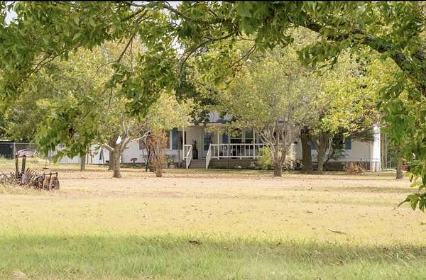 6.24 Acres of Land with Home for Sale in Blum, Texas