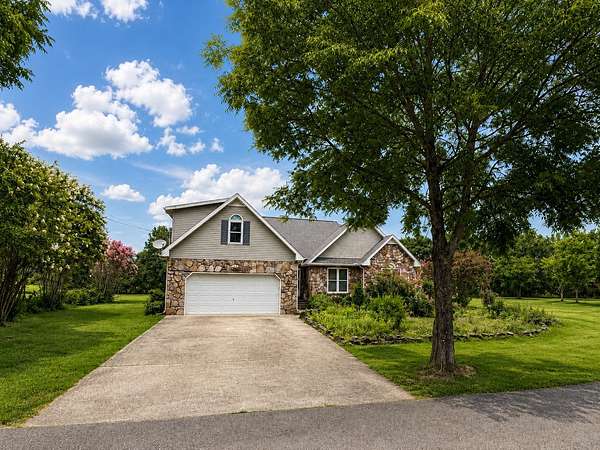 1.74 Acres of Land with Home for Sale in Smithville, Tennessee
