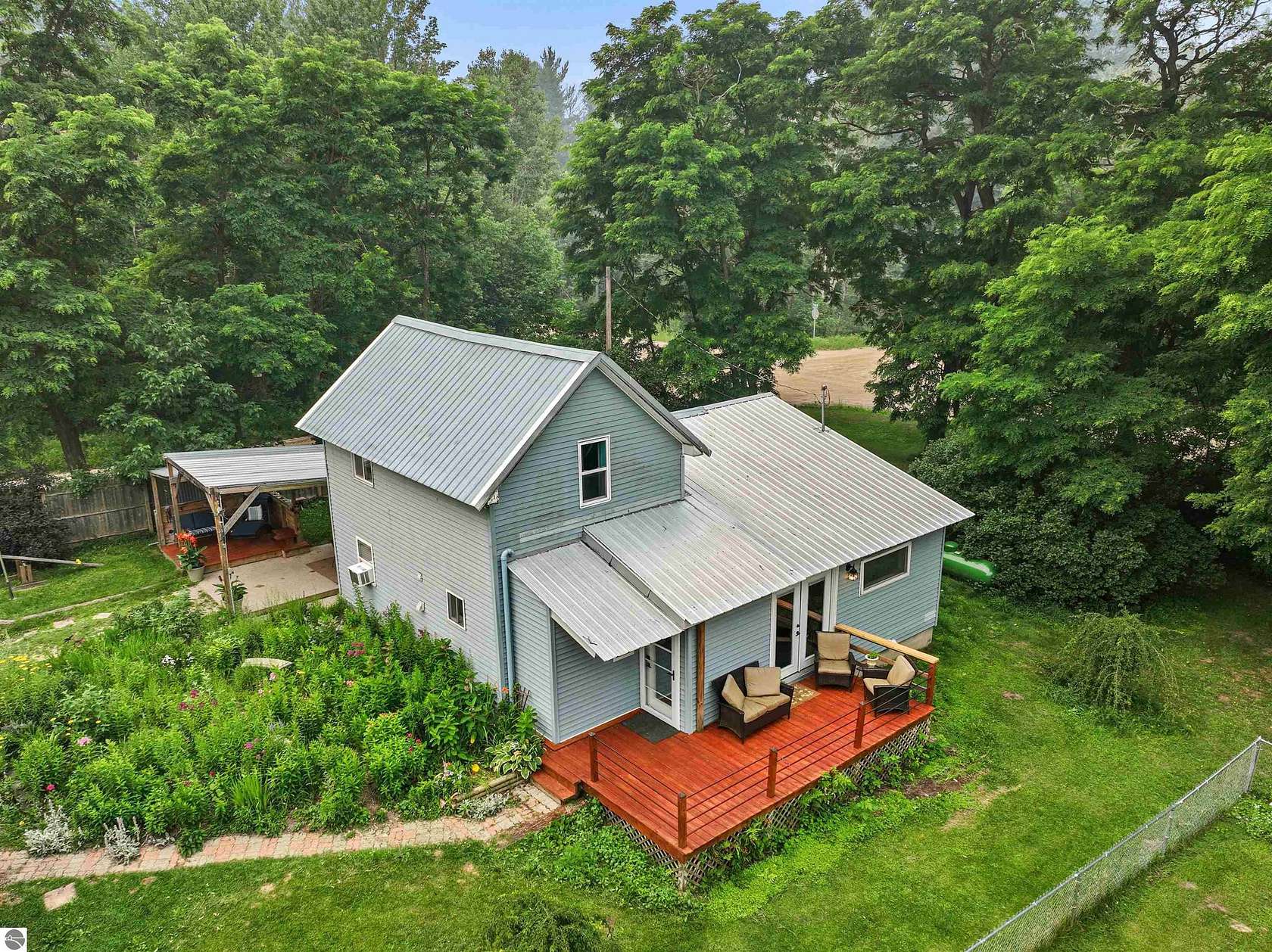 2.5 Acres of Land with Home for Sale in Kingsley, Michigan