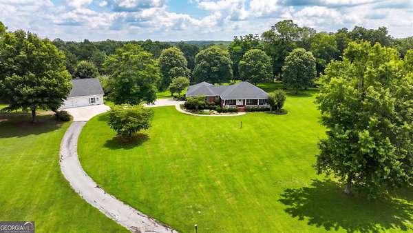 5.58 Acres of Land with Home for Sale in Grantville, Georgia