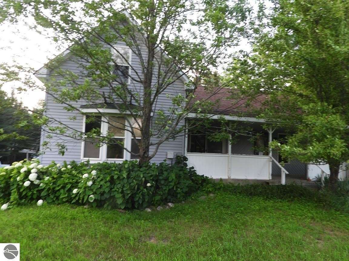 2 Acres of Land with Home for Sale in Manton, Michigan