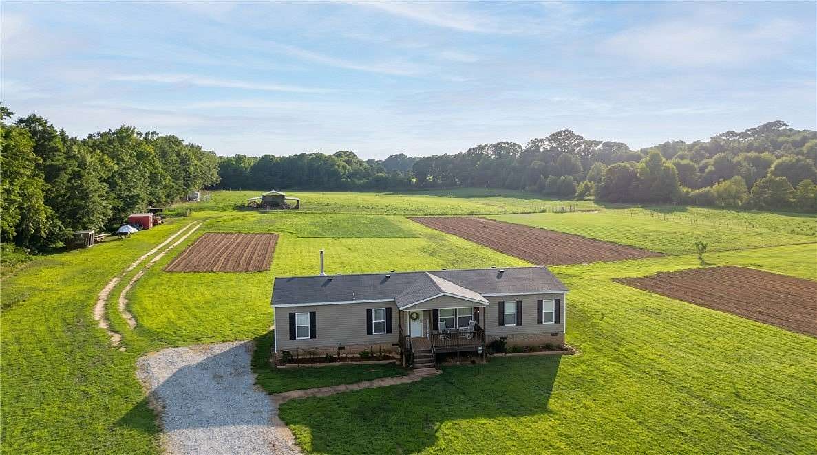 11.4 Acres of Land with Home for Sale in Starr, South Carolina