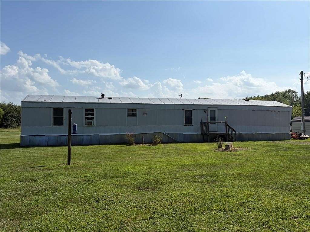 10 Acres of Land with Home for Sale in Garden City, Missouri