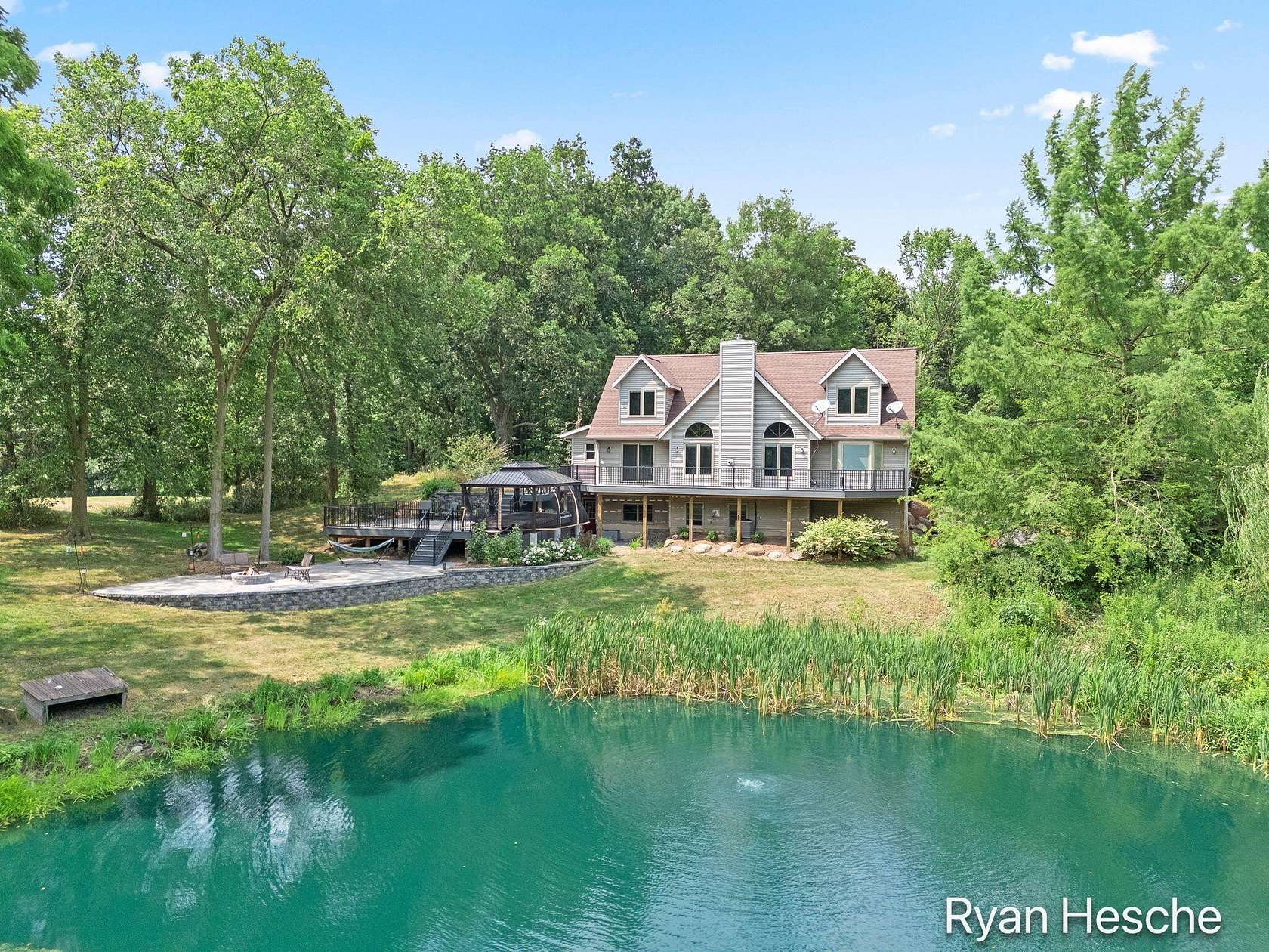 33.6 Acres of Recreational Land with Home for Sale in Saranac, Michigan