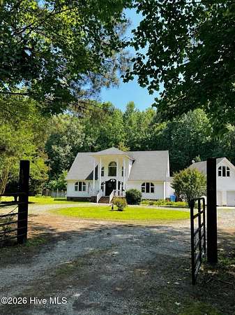 6.76 Acres of Land with Home for Sale in Knotts Island, North Carolina