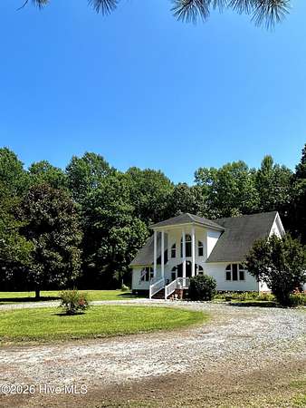 6.76 Acres of Land with Home for Sale in Knotts Island, North Carolina