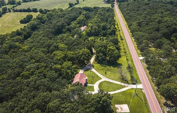 27.9 Acres of Land with Home for Sale in Crocker, Missouri