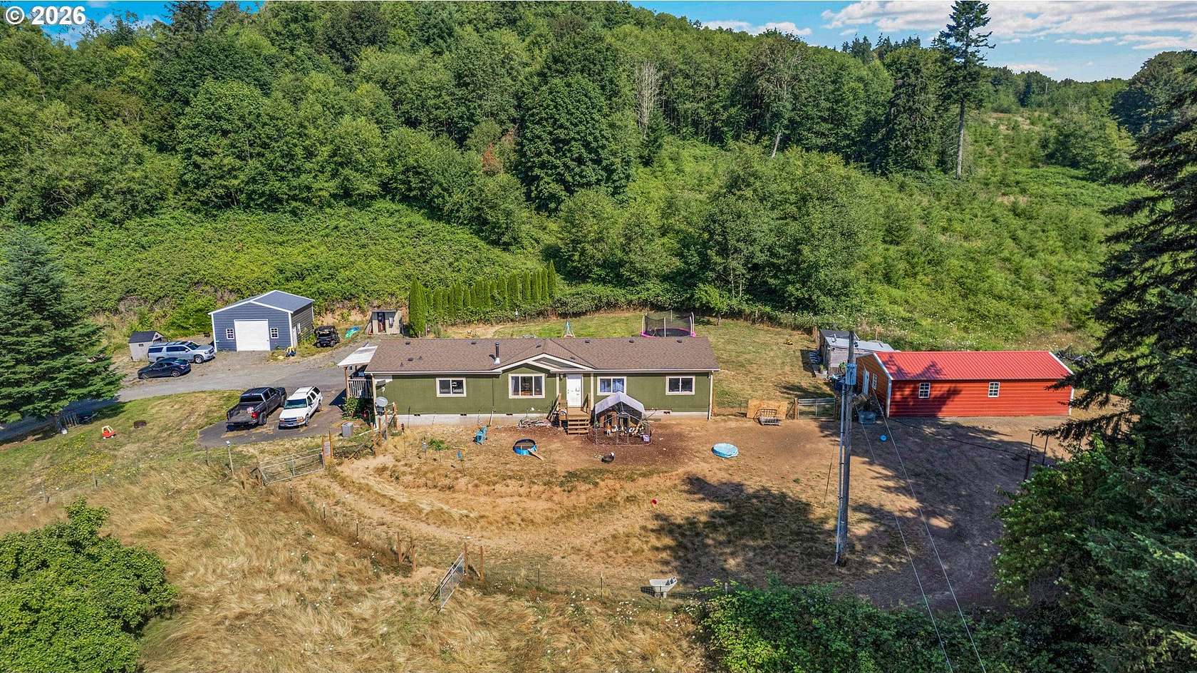7.63 Acres of Land with Home for Sale in Rainier, Oregon
