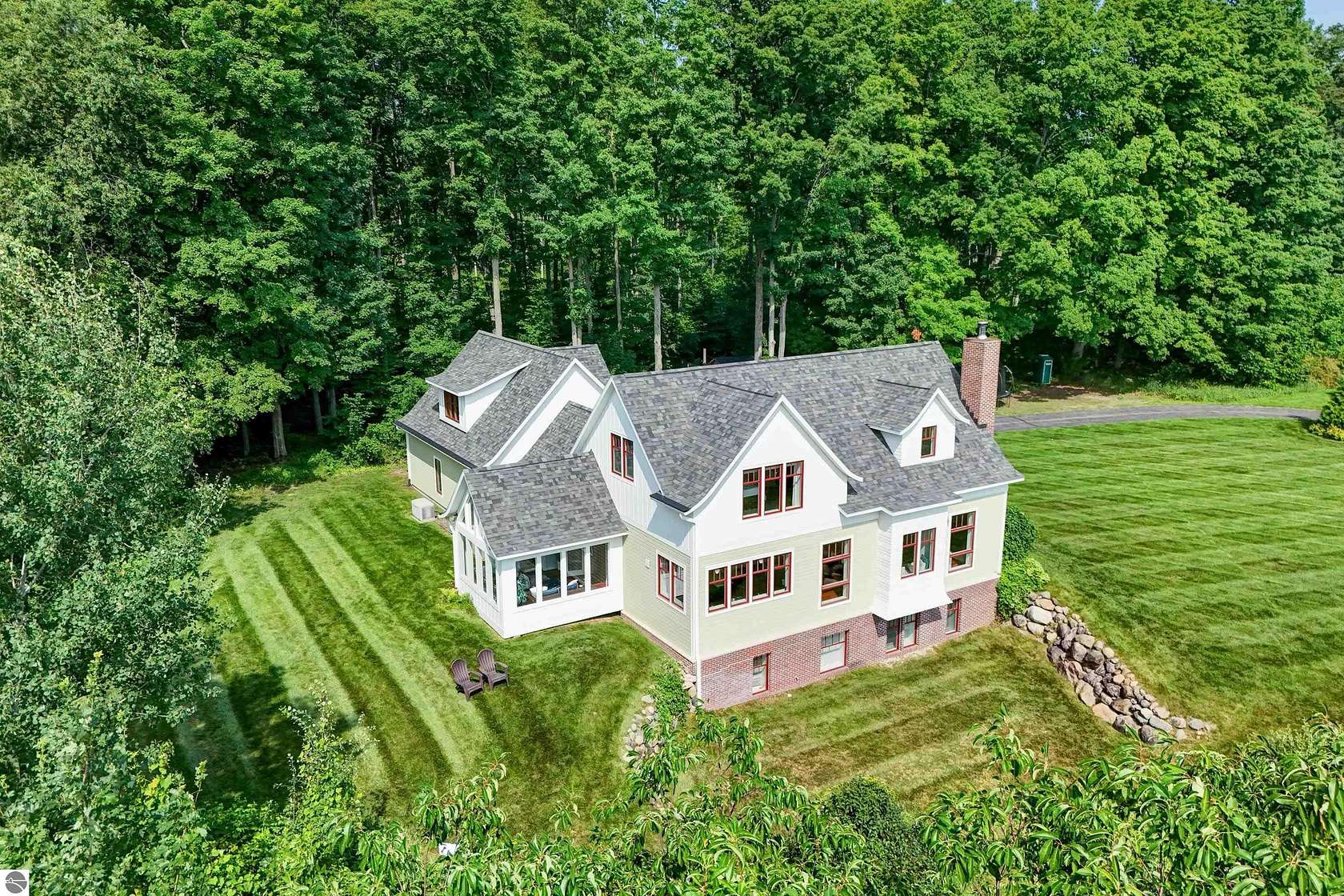 7 Acres of Land with Home for Sale in Williamsburg, Michigan