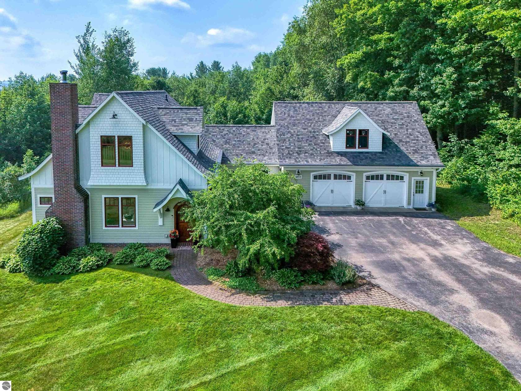 7 Acres of Land with Home for Sale in Williamsburg, Michigan