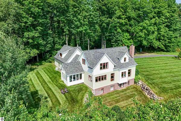 7 Acres of Land with Home for Sale in Williamsburg, Michigan