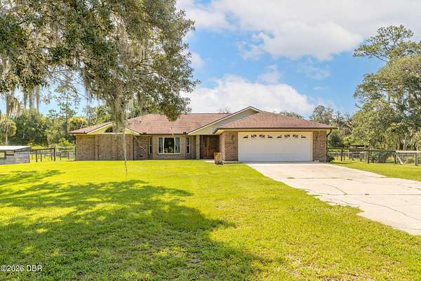 2.5 Acres of Land with Home for Sale in New Smyrna Beach, Florida