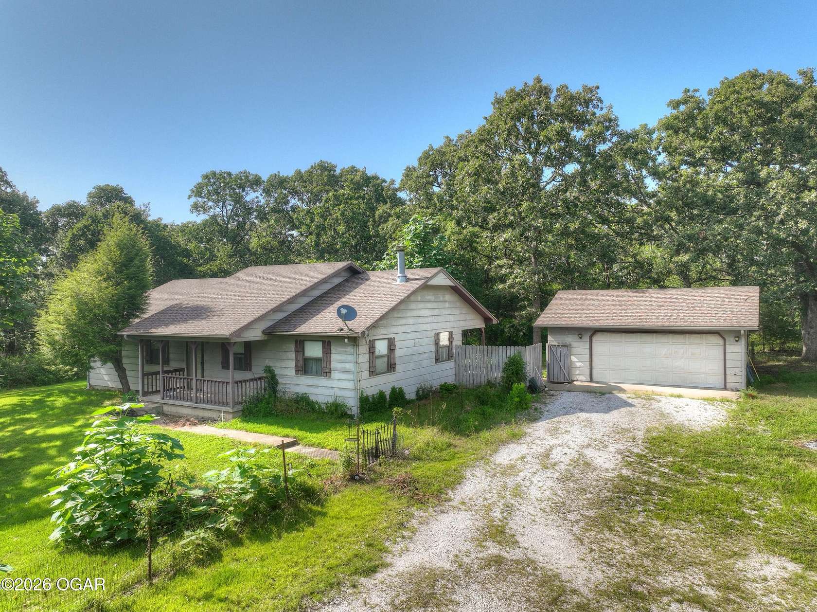 3.47 Acres of Land with Home for Sale in Joplin, Missouri