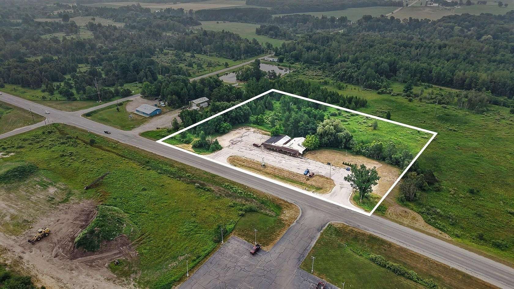 5.86 Acres of Improved Commercial Land for Sale in Reed City, Michigan