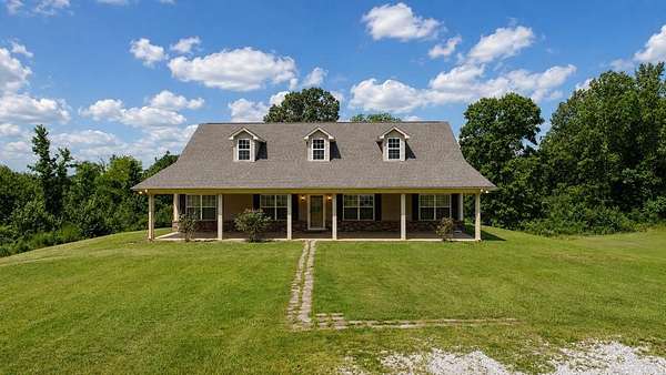 10 Acres of Land with Home for Sale in Bruce, Mississippi