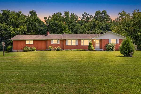 4.2 Acres of Land with Home for Sale in Cunningham, Tennessee