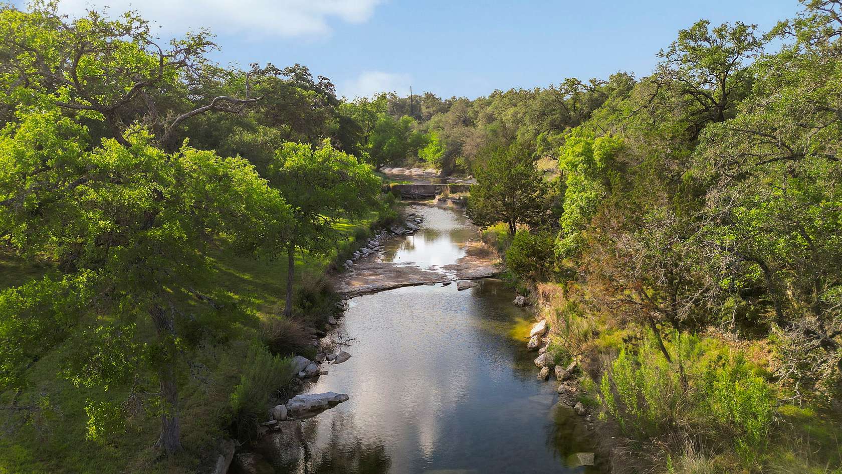 62.2 Acres of Recreational Land with Home for Sale in Dripping Springs, Texas