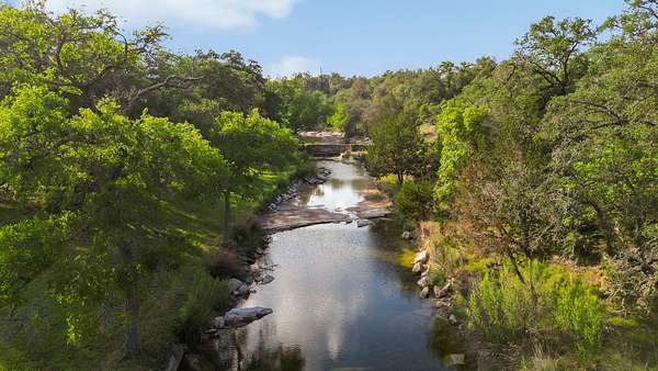 62.2 Acres of Recreational Land with Home for Sale in Dripping Springs, Texas