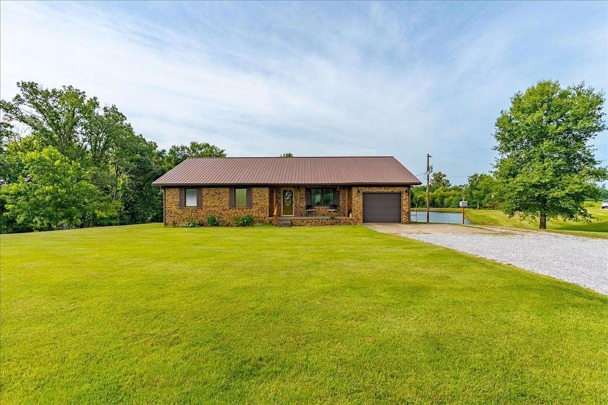 5 Acres of Land with Home for Sale in Morganfield, Kentucky
