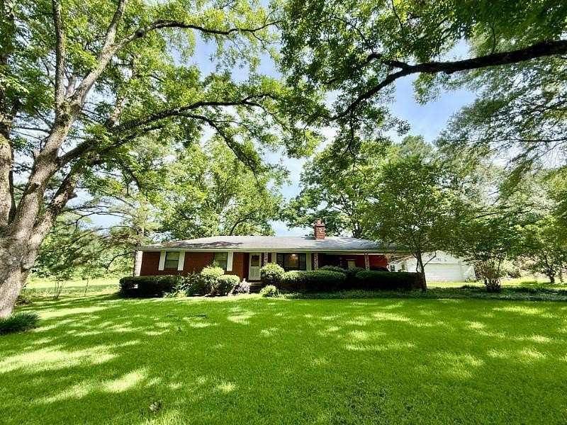 4.9 Acres of Land with Home for Sale in Houston, Mississippi