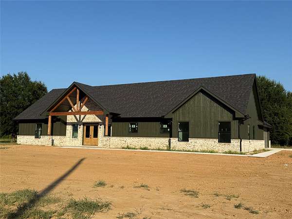 2.16 Acres of Land with Home for Sale in Blossom, Texas