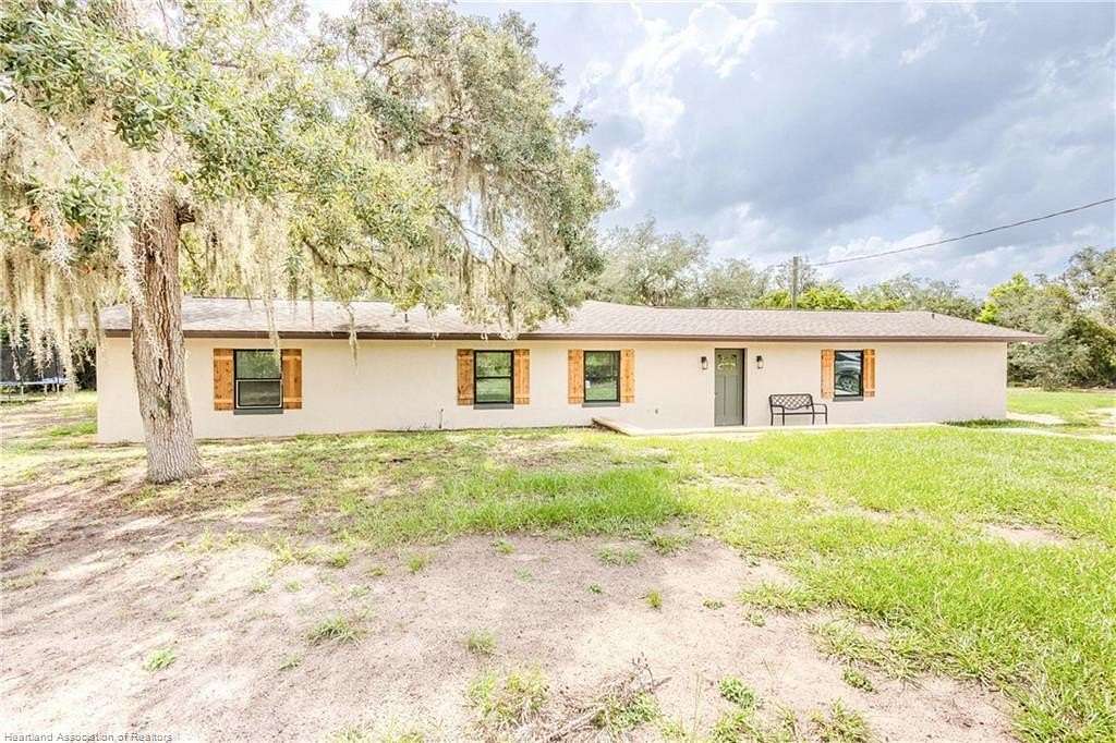 1.79 Acres of Land with Home for Sale in Sebring, Florida