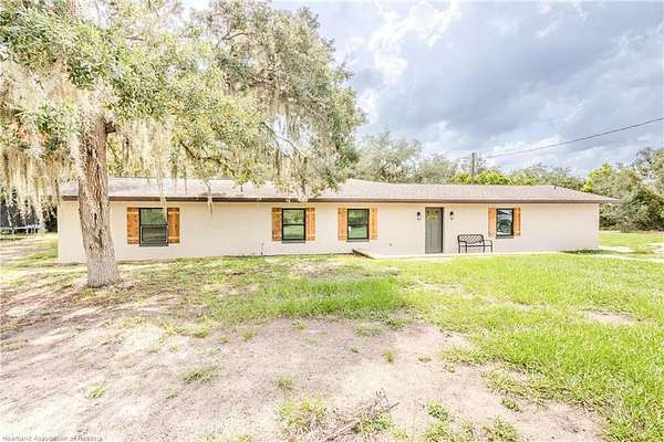1.79 Acres of Land with Home for Sale in Sebring, Florida