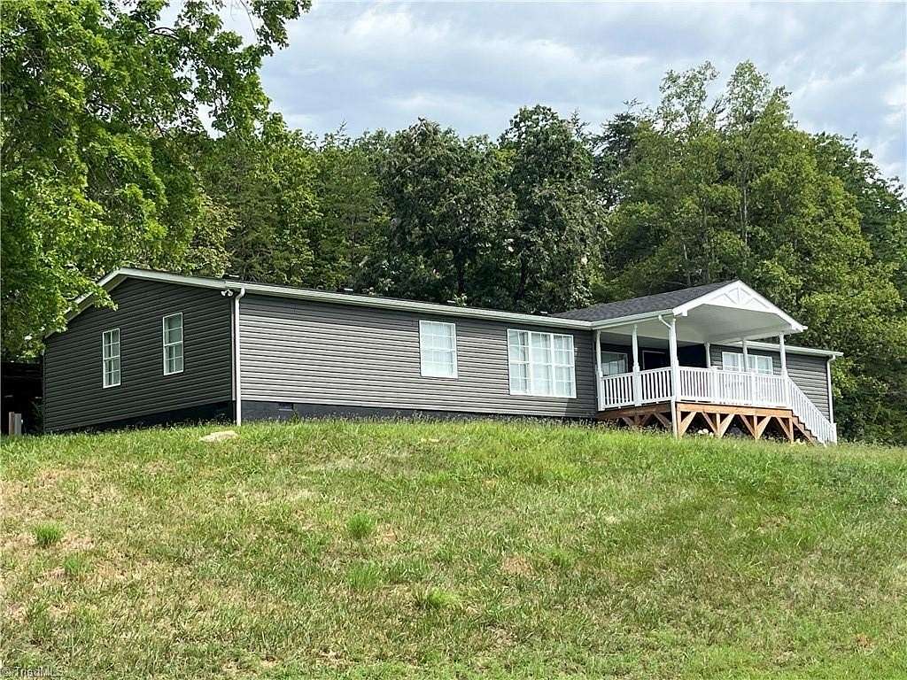 3.38 Acres of Land with Home for Sale in Walnut Cove, North Carolina