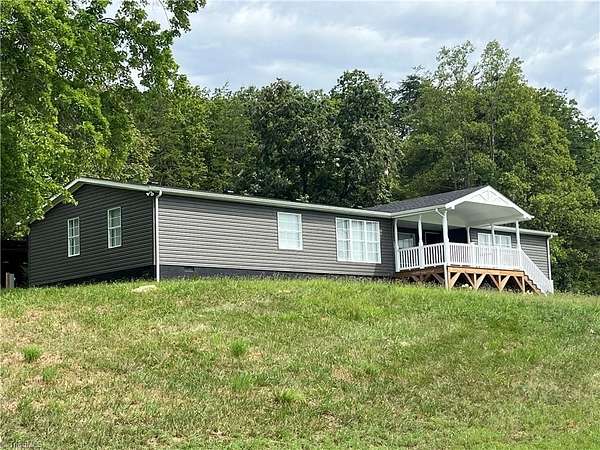 3.38 Acres of Land with Home for Sale in Walnut Cove, North Carolina