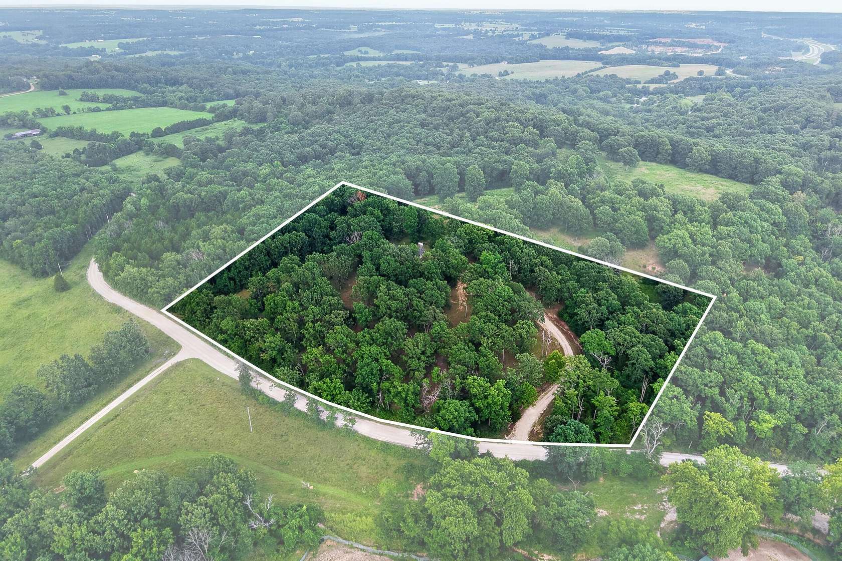 5 Acres of Land with Home for Sale in Strafford, Missouri