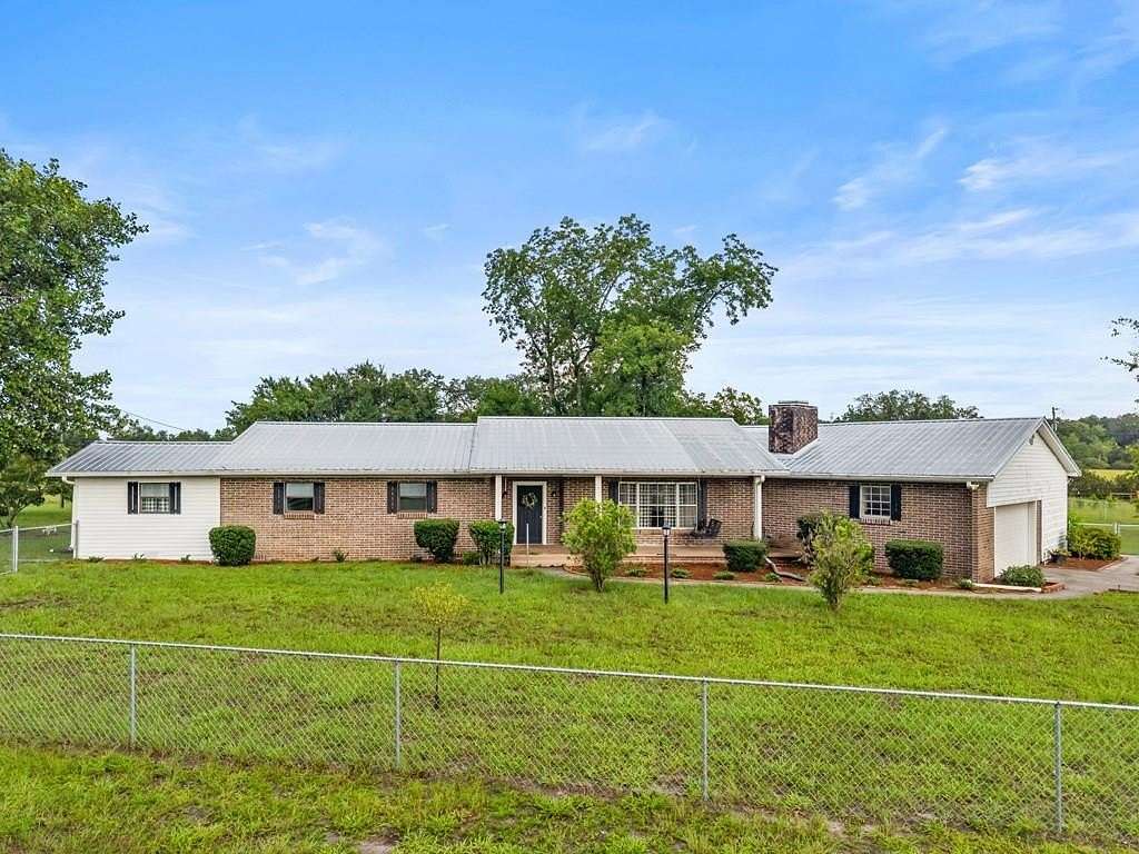 14.3 Acres of Recreational Land with Home for Sale in Branford, Florida