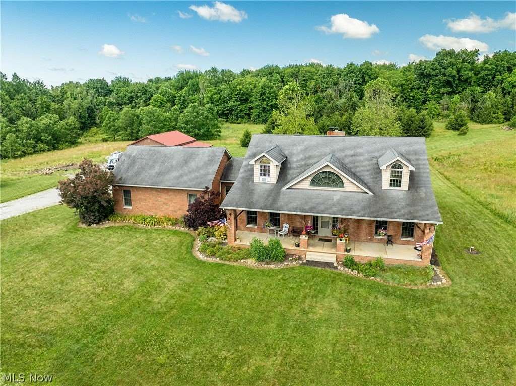 13.1 Acres of Recreational Land with Home for Sale in Alliance, Ohio