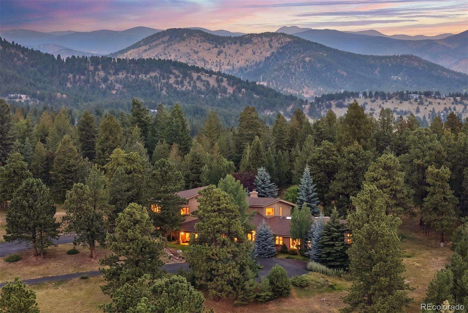 5 Acres of Land with Home for Sale in Evergreen, Colorado