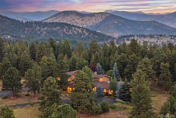 5 Acres of Land with Home for Sale in Evergreen, Colorado