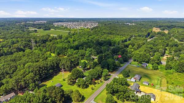 3 Acres of Land with Home for Sale in Indian Trail, North Carolina