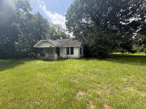 4.26 Acres of Land with Home for Sale in Palestine, Texas