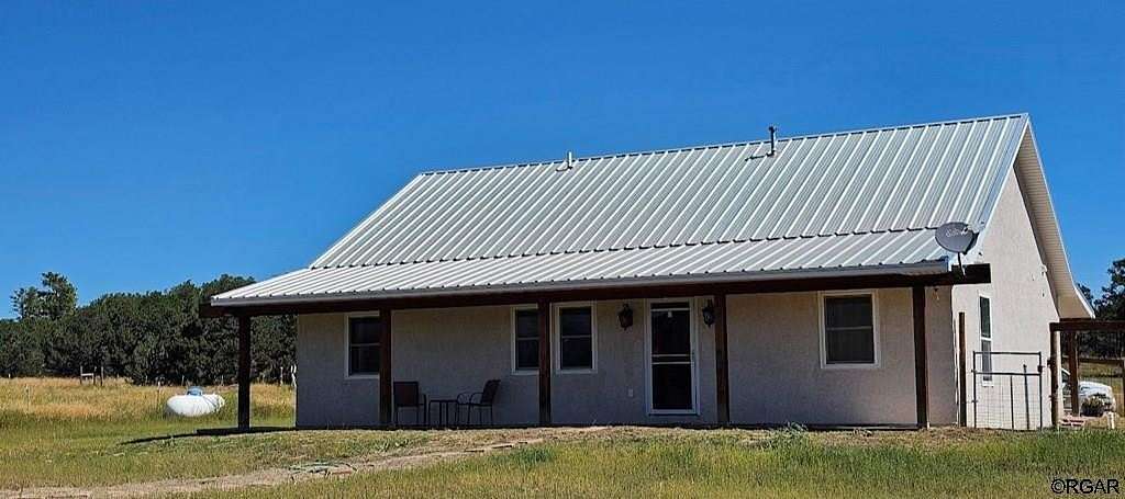 5 Acres of Land with Home for Sale in Cotopaxi, Colorado