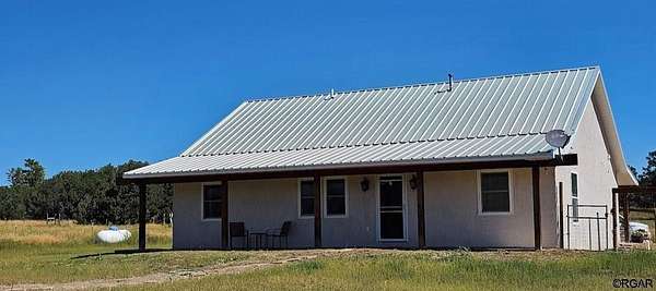 5 Acres of Land with Home for Sale in Cotopaxi, Colorado