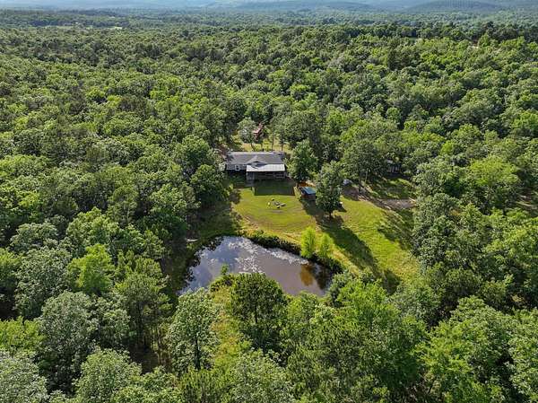 91.2 Acres of Recreational Land with Home for Sale in Antlers, Oklahoma