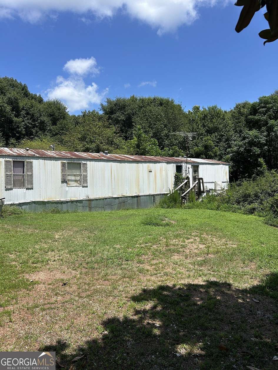 4.75 Acres of Land with Home for Sale in Royston, Georgia