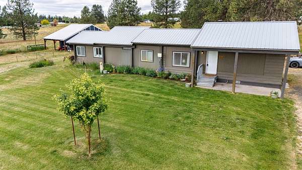 5 Acres of Land with Home for Sale in Colbert, Washington