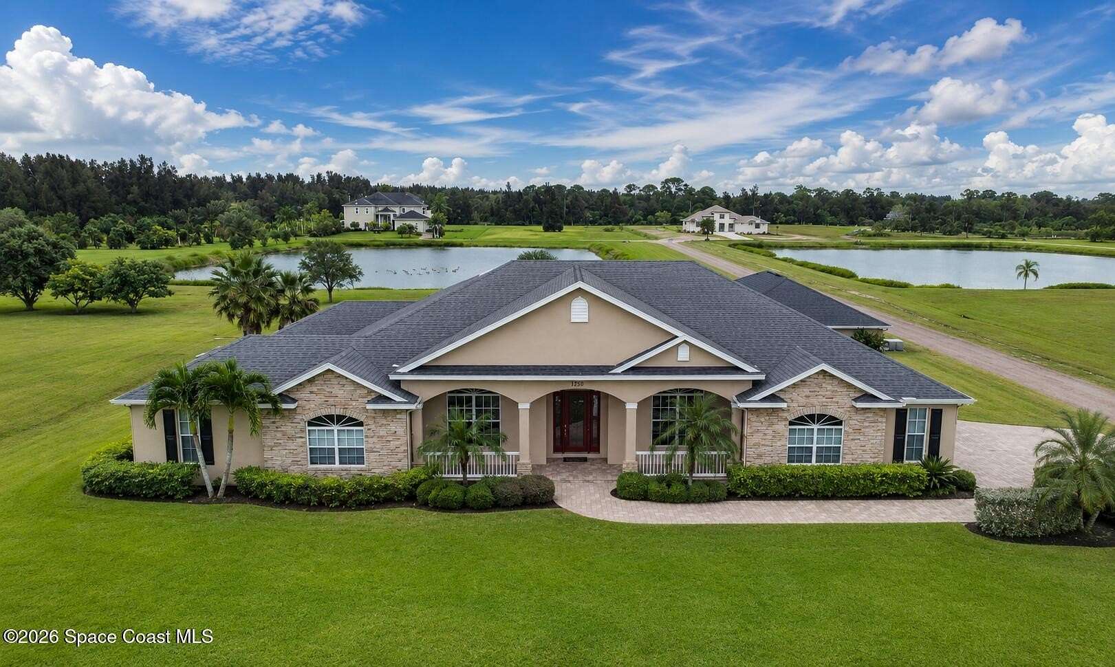 2.5 Acres of Land with Home for Sale in Merritt Island, Florida