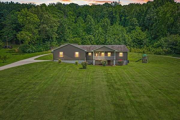 3.5 Acres of Land with Home for Sale in Riceville, Tennessee